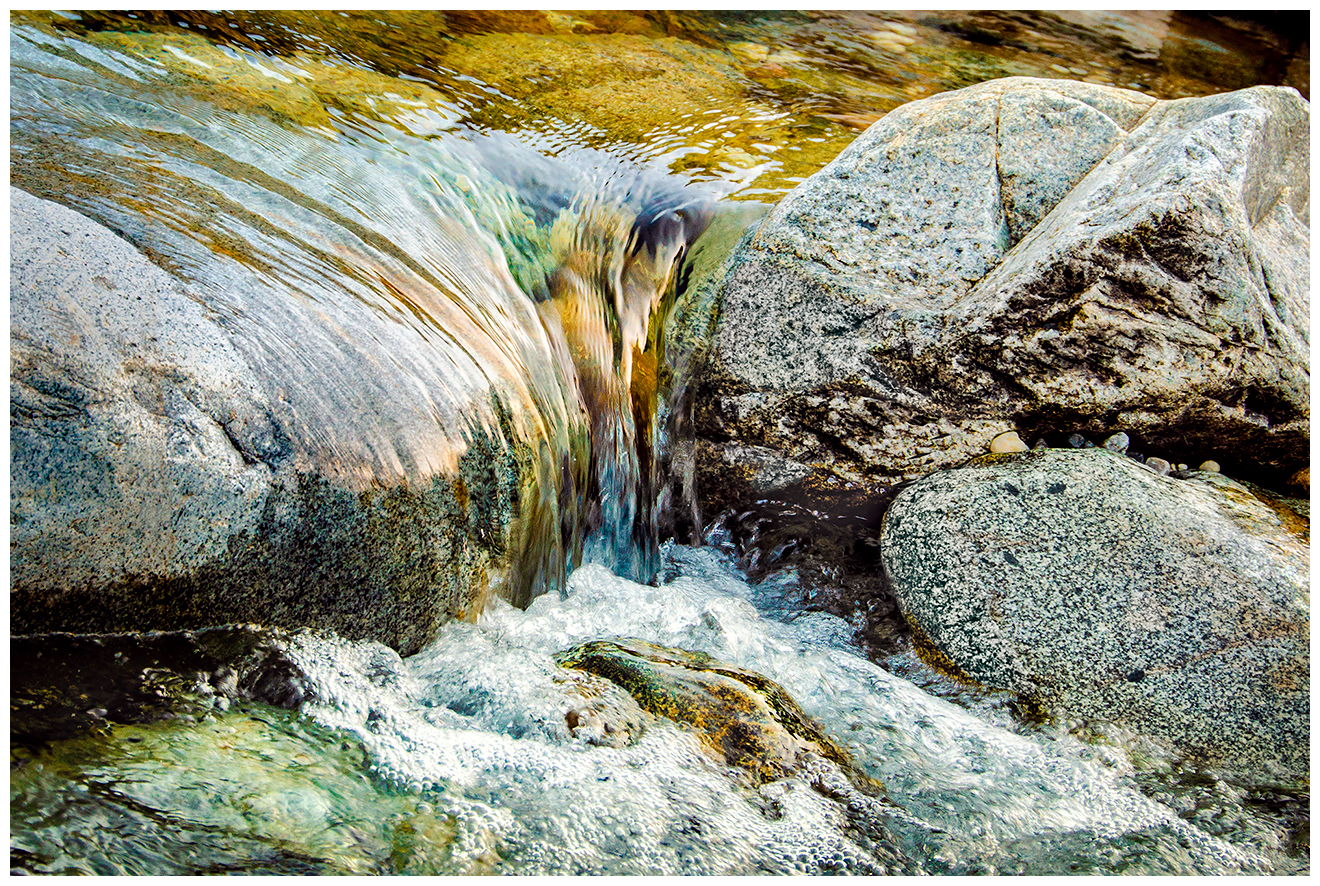 River water flows over rocks in the Yuba River