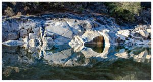 Rocks reflected in the water of the Yuba River